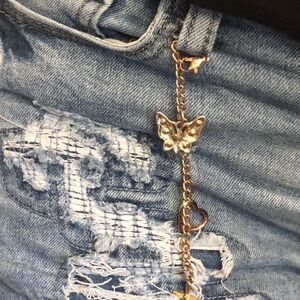 072 Elegant Blue Jeans with Butterfly Chain Accent
Making charms